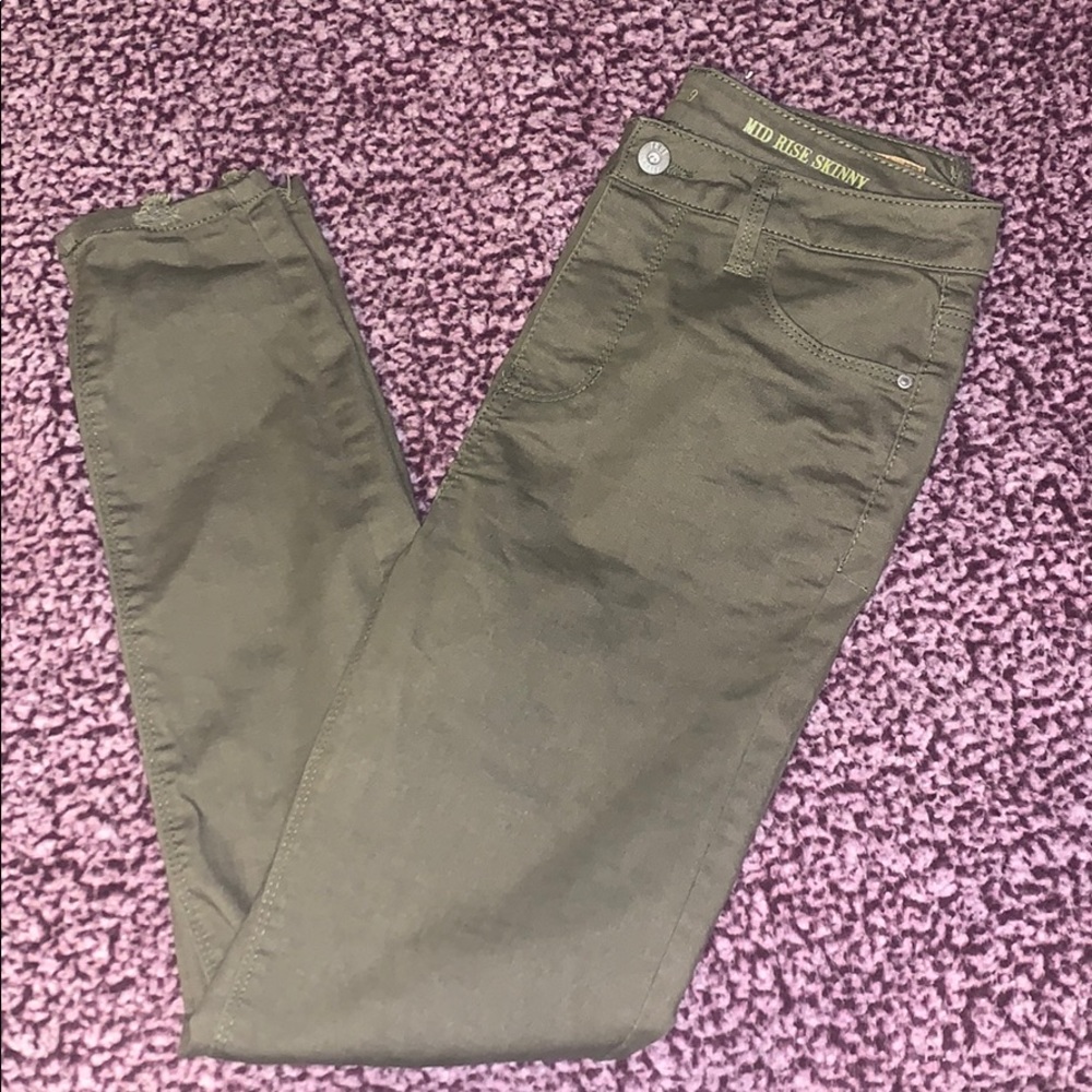 True Craft olive green distressed jean/jegging.